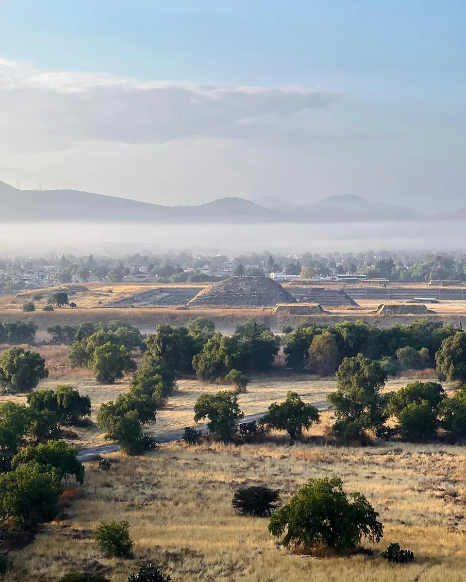 The launch field with the Teotihuacan pyramids behind it in the morning mist