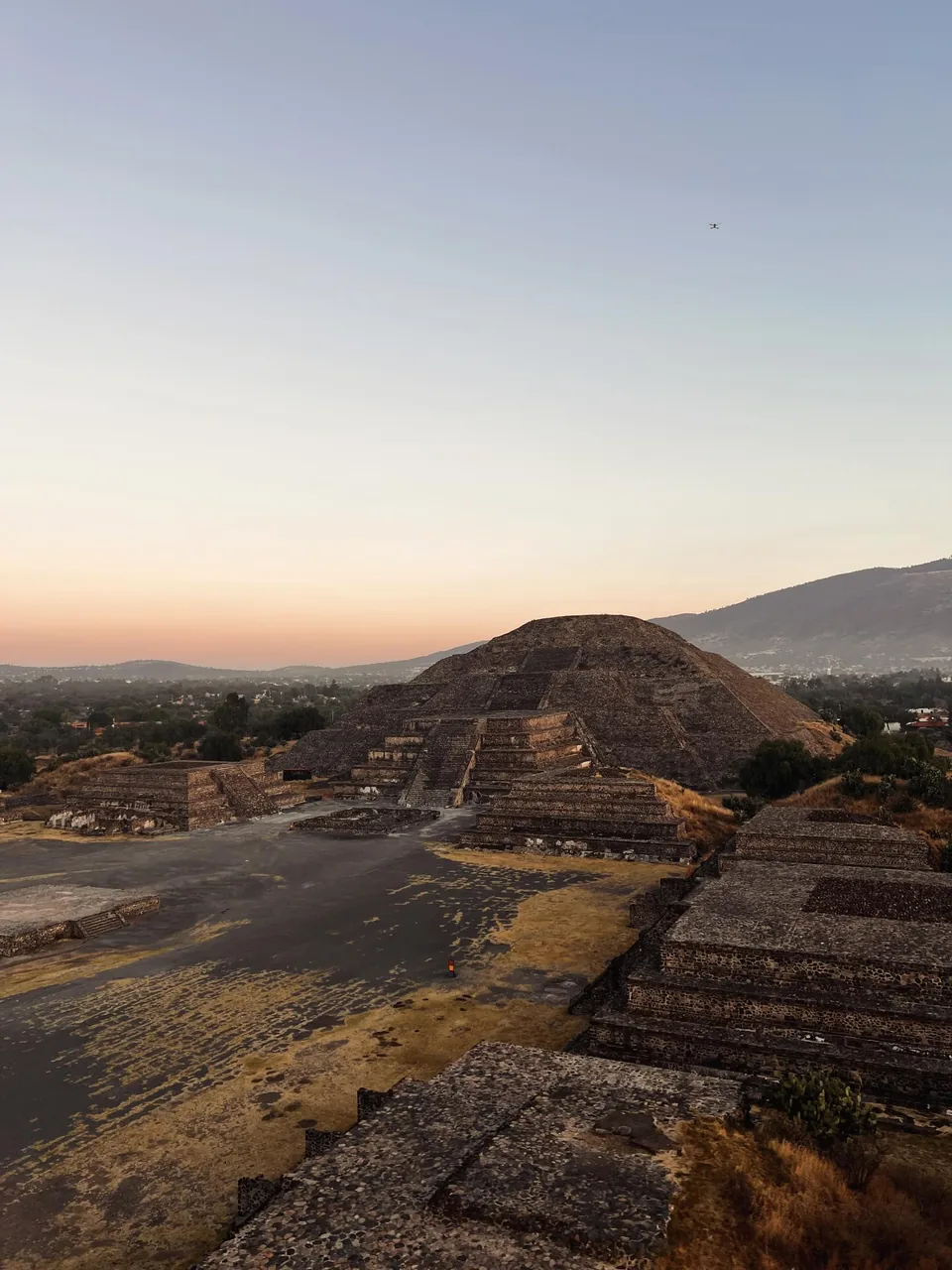 The Pyramid of the Moon and the plaza in front of it at first light, seen from the air